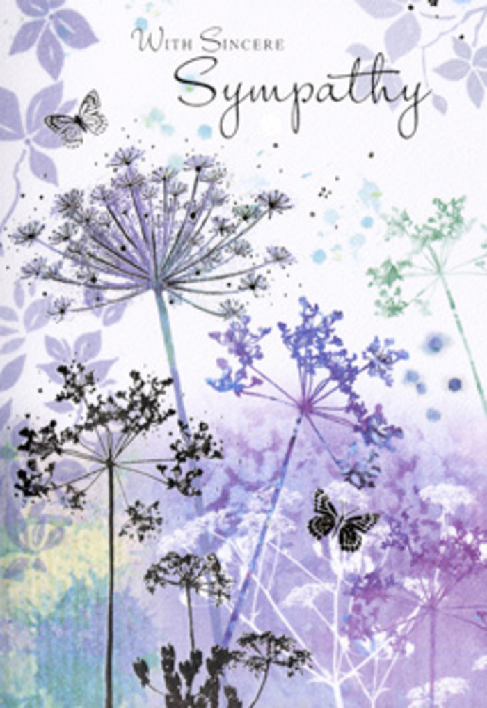 There is a peaceful, almost meditative quality to this sympathy card, as if someone captured the stillness of a Stratford evening and translated it into watercolour and line. Across the card, tall, spindly wildflowers arch gracefully, each slender stem topped with an umbel of tiny clustered florets that resemble fine lace held against the sky. The blossoms are painted in layered tones of violet, heather, soft blue and muted green, with hints of silvery light at their tips that give them a barely-there, ethereal presence. Behind the detailed blooms, the background drifts in blurred gradients-pale lavender dissolving into cool blue-grey, like distant fields fading into the horizon beyond Stratford High Street when the light begins to dim. This gently unfocused setting adds depth and comfort, inviting the eye to rest. Two light, near-transparent butterflies hover above and between the flowers, their wings open in quiet suspension, suggesting continuity, hope and the delicate movement of the spirit. The entire composition feels intentionally spacious, with breathing room around each stem, allowing the symbolism of every element-the upward stretch, the leaning curves, the hovering wings-to settle in the heart. The light is soft, almost overcast, reinforcing a mood of gentleness and reflection rather than drama. For someone sending condolences to a family in Stratford, Forest Gate or nearby, this card offers more than a simple image: it becomes a visual pause, an invitation to remember and to feel supported. As a florist who helps local families choose tributes that speak softly yet meaningfully, I recognise how this design pairs beautifully with understated sympathy flowers, whether laid at a service or delivered quietly to a home where grief is being held with care.