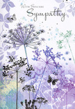 This sympathy card reads like a quiet verse painted in blooms, echoing the tranquil corners of Stratford's parks at twilight. Airy silhouettes of wildflowers, with fine, reaching stems and delicate umbel heads, rise from a softly blended background of lavender, indigo and sky-washed blue. The petals and small clustered florets at the top of each stem are rendered with such lightness that they appear to glimmer at the edges, as though catching the last, cool light over West Ham Park. Beneath and behind the main flowers, faint impressions of additional petals and leaves drift across washes of silvery green and muted purple, creating a gentle sense of depth without crowding the composition. Here and there, butterflies hover near the blooms, their wings translucent and only lightly outlined, offering a subtle suggestion of transformation, continuity and the unseen presence of those we miss. The overall colour palette is cool yet comforting, like a deep breath on a calm evening by the Olympic Park waterways, soothing to both eye and spirit. Across this serene backdrop, the words With Sincere Sympathy appear in flowing script, resting above the stems like a softly spoken phrase. The card's rhythm of line, space and colour feels respectful and composed, ideal for expressing condolences without overwhelming the recipient. As someone who arranges sympathy flowers for families throughout Stratford and the surrounding E15 area, I can sense how this design would sit beautifully alongside a modest spray or hand-tied sheaf, carrying the same message of gentle support and quiet remembrance, and arriving by local delivery as a thoughtful gesture in a difficult time.
